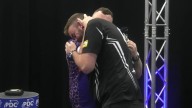 Emotional darts star consoled by opponent he beat in final of tournament