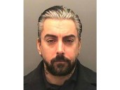 Two men charged in prison murder of Lostprophets singer