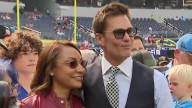 NFL star Jayden Daniels’ mom turns heads in eye-catching outfit alongside Tom Brady as fans call her ‘out of this world’