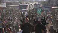 The Latest: Living hostages and Palestinian prisoners freed as Trump tours region