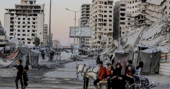 Israel and Hamas reach initial ceasefire deal. And, National Guard arrive near Chicago