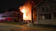 Crews battling large house fire on Indy's near north side