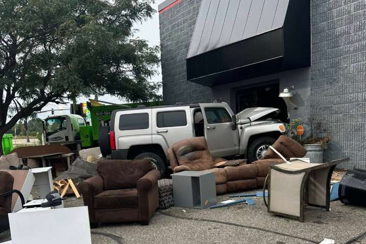 Driver crashes through entrance of Twin Cities used furniture store