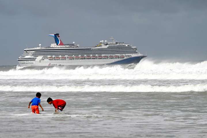 Hurricanes Humberto and Imelda charge toward Bermuda as the tiny island prepares