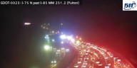 Police scene shuts down I-75 northbound at Northside Drive