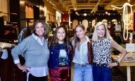 Stylists at Evereve in downtown Naperville help dress women