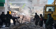 At least 14 dead after school collapses in Indonesia with nearly 50 students still missing