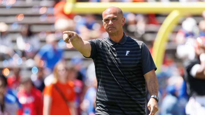 Who is Florida interim football coach Billy Gonzales?