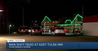 Man wearing ski mask shot, killed at Tulsa hotel
