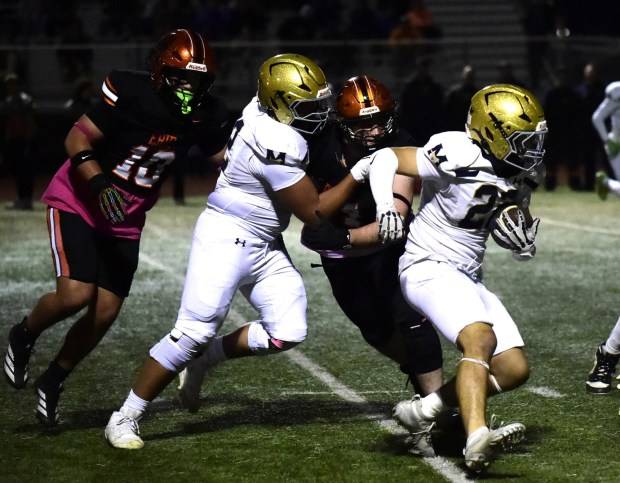 Michigan football’s Mason Bonner leads Mullen past Erie