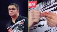'All over the place' - Darts star's hands bleed during win over Michael van Gerwen