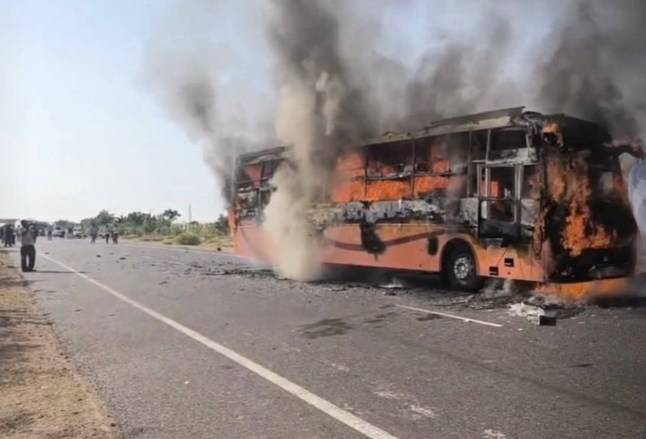 At least 20 people feared dead after bus fire traps passengers