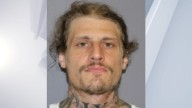 Authorities continue search for Ballston robbery suspect after hotel raid