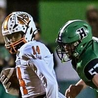 Yellow Jackets sting Harlan, clinch home playoff game
