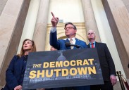 The blame game is on at federal agencies, where political messages fault Democrats for the shutdown