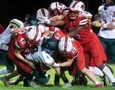 See photos as Michigan Center football tops Napoleon on homecoming