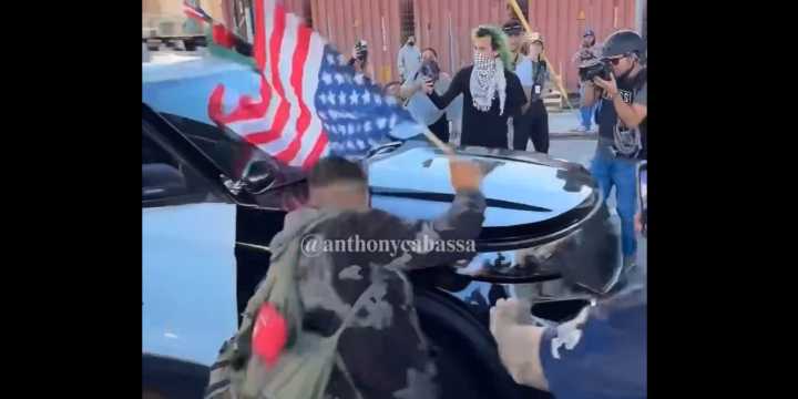 Anti-ICE agitator acts hurt after being 'ran over' by LAPD — but video shows the real story
