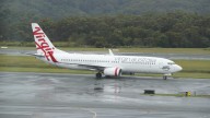 Virgin Australia announces new one-bag limit for economy flyers in bid to speed up boarding and boost efficiency