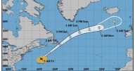 Hurricane Melissa hurrying away from Bermuda. Maps show its forecast path.