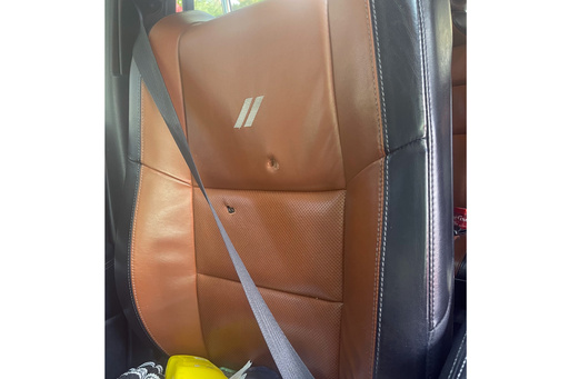 Police report omits a federal agent's shooting at a DC driver. The man's lawyers suspect a cover