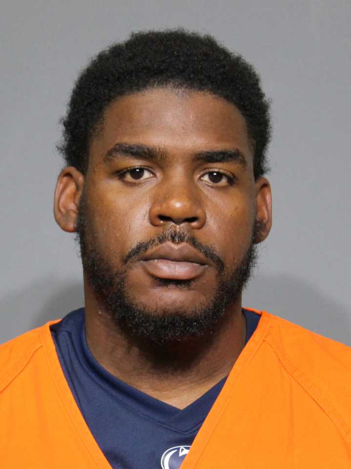 CMS coach arrested, accused of shooting into occupied property