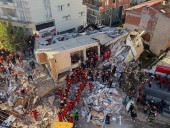 Turkey building collapse kills 2, traps 3 others under rubble