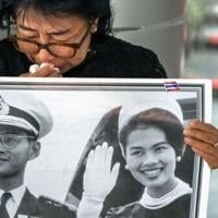Black-clad Thai mourners weep for former Queen Sirikit