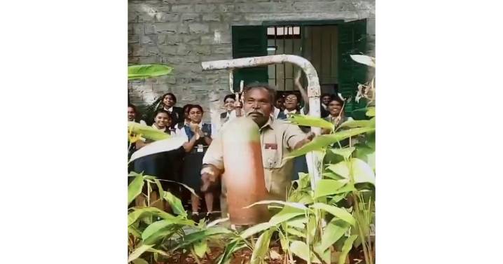 Students cheer as Das 'Uncle' rings school bell for the last time