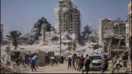 Israel suspends Gaza aid, at least 19 killed in retaliatory strikes