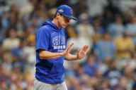 Cubs head back home on the brink of elimination after losing 2 straight in Milwaukee