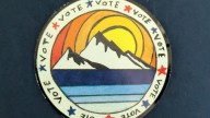 Who pays postage for vote