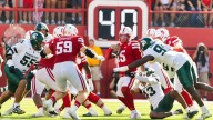 Nebraska breaks away from the Spartans late to win 38