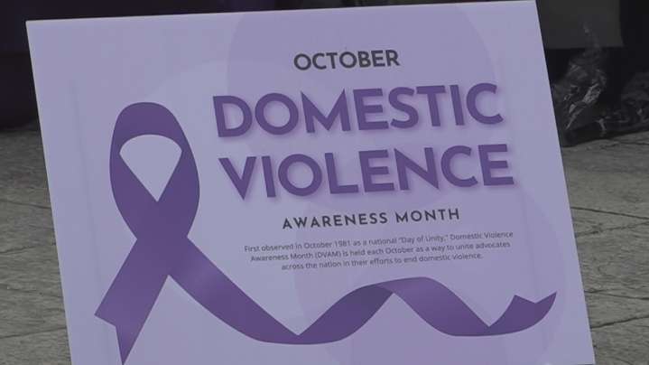 Survivors walk for Domestic Violence Awareness Month in Mecklenburg County