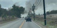 Crews extinguish brush fire near Maui highway
