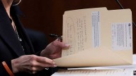 'Hypocrite!' Pam Bondi's attack notes snapped by photographer during contentious hearing
