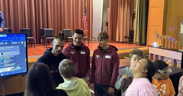 Players and coaches from Elba boys basketball visit students at NYSSB