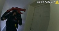Moment police smash their way into Warwickshire flat