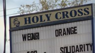 'A betrayal of trust' | Former Holy Cross coach fired after police say a hidden camera in his office captured students undressing