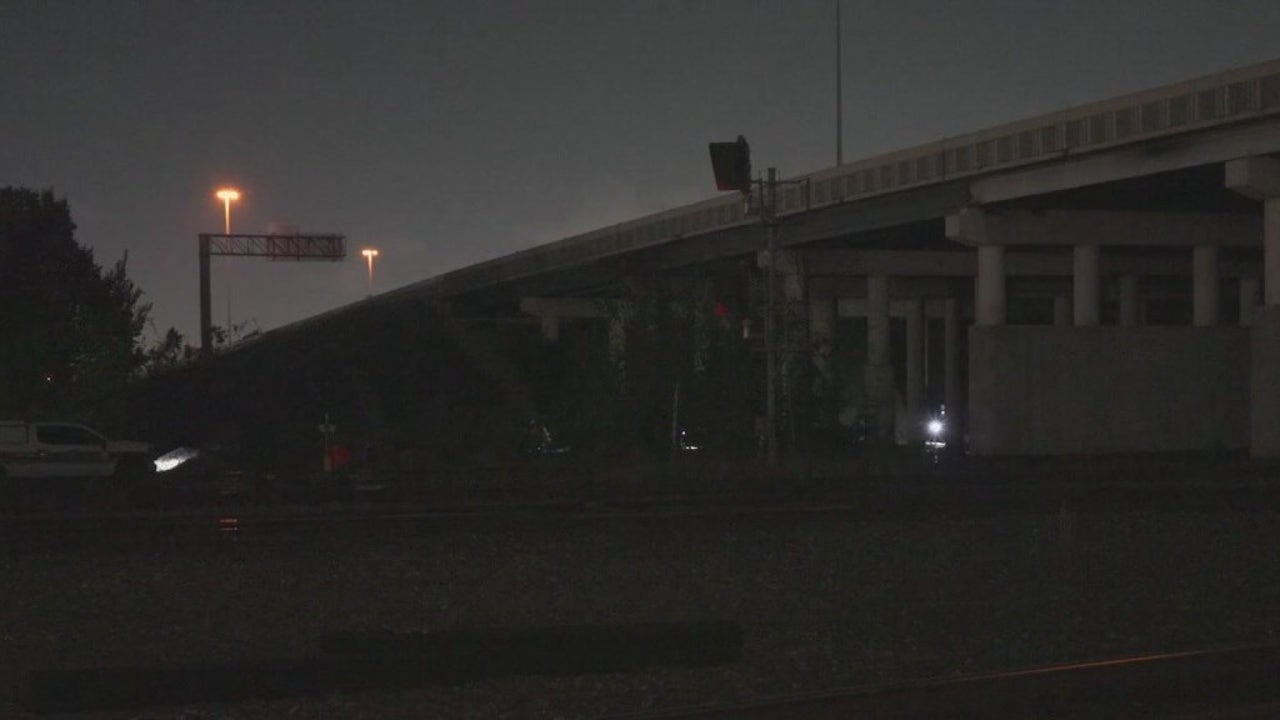 Man reportedly found hanging, on fire under Houston's North Loop