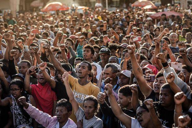 Madagascar president leaves country after soldiers turn against him
