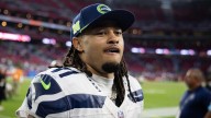 Ref who protected Jaxon Smith-Njigba during wild sideline melee is a former NFL player