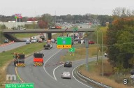 Semi hauling a pedestrian bridge strikes overpass, closing Twin Cities highway
