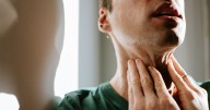 Breast cancer symptom that causes lumps and swelling in other parts of the body