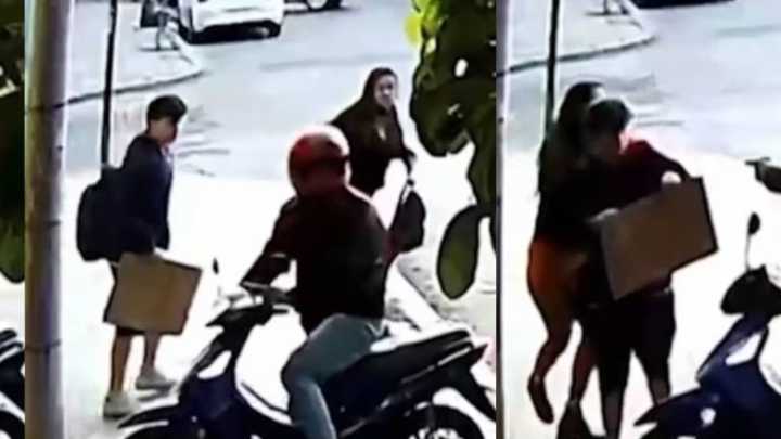 Impactante intento de robo a una madre y su hijo quedó registrado en cámaras de seguridad: ‘Dame todo o lo mato’