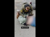 Federal agents detain a Chicago TV station employee