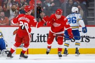Remarkable rally lifts Red Wings past Blues to end skid