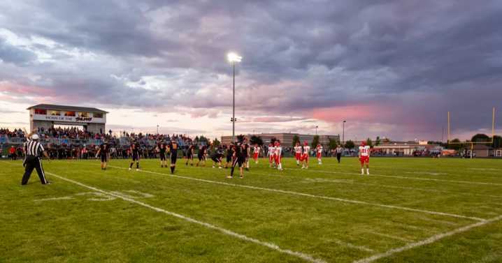 Post Falls football players under fire for promotional photo depicting mock execution of rival Coeur d’Alene player
