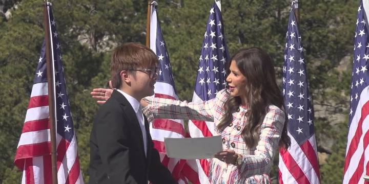 Noem returns for naturalization ceremony at Mount Rushmore