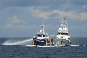 China, Philippines trade blame over boat collision in disputed sea
