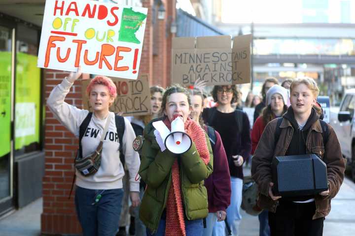 Students protest Minnesota Power sale in downtown Duluth